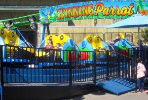 12 Spinning Parrot Coaster The Island features two new rides