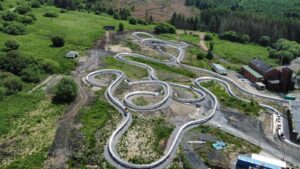Tower Coaster Aerial Shot 2 Another major moment for South Wales tourism as a European-first rollercoaster has launched at Zip World Tower